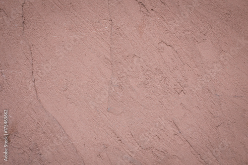 Concrete brown painted rugged  plastered wall