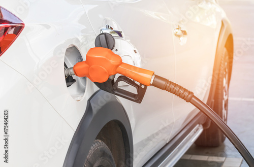 fuel nozzle refueling gas pump for the car in gas service station 