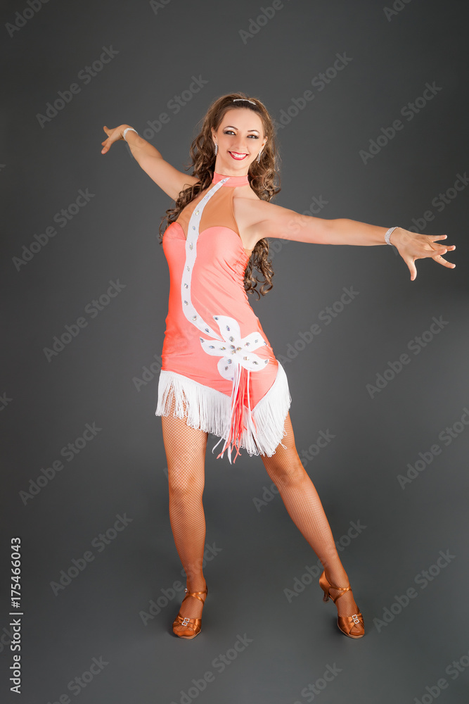 Brunette Elegant Lady in Pink Dress Poses in Studio Brunette Elegant Lady in Pink Dress Poses in Studio