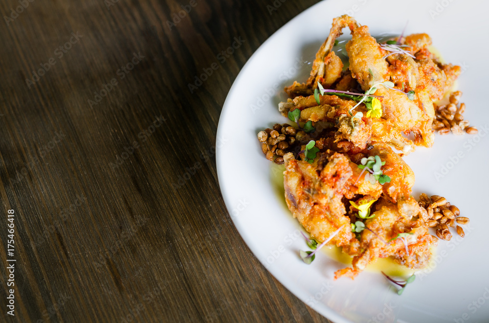 frog legs with sauce, restaurant food frog legs with sauce, restaurant food