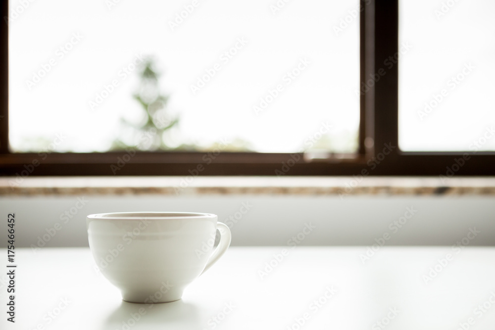 Coffee mug on a window sill. Morning coffee Coffee mug on a window sill. Morning coffee