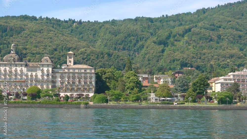 Water town and green mountains. Picturesque view summer. Water town and green mountains. Picturesque view summer.