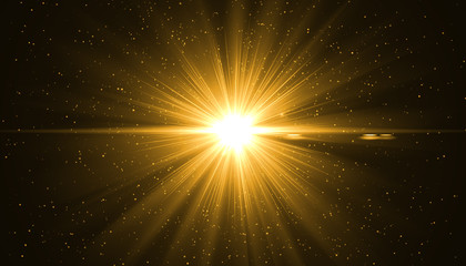 Golden sunray with sparkles or gold particle glitter light. Merry Christmas festive background.defocused circle particle bokeh. Abstract gold background