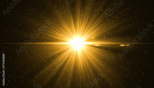 Golden sunray with sparkles or gold particle glitter light. Merry Christmas festive background.defocused circle particle bokeh. Abstract gold background