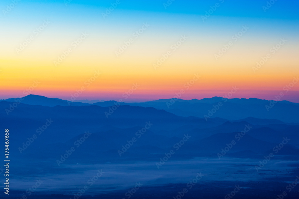 Beautiful silhouette mountains sunrise at Doi Inthanon National Park. Chiang Mai, Thailand.