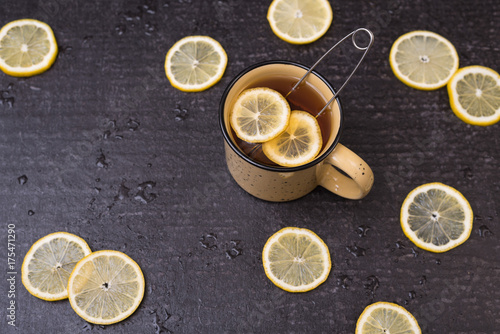 Lemon tea on a black background
