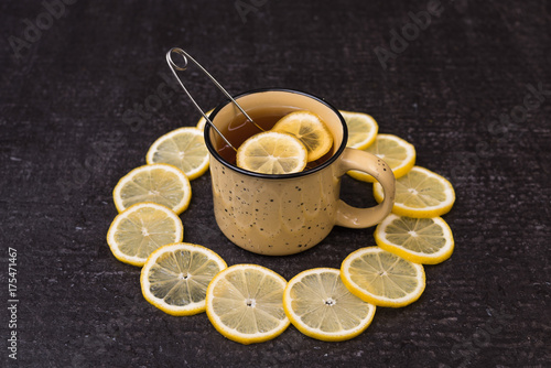 Lemon tea on a black background