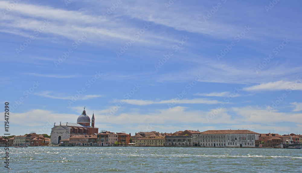 The island of Giudecca in the Dorsoduro quarter of Venice, viewed from the opposite side of the Giudecca canal. Il Redentore stands out on the skyline.