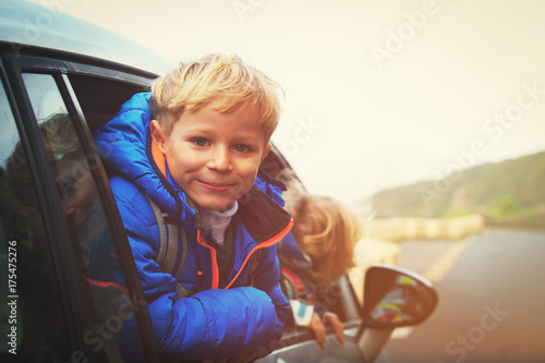 happy little boy and girl travel by car © nadezhda1906