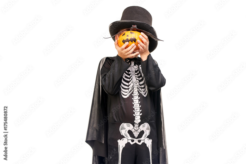 Studio portrait of little boy in Halloween costume against white background Studio portrait of little boy in Halloween costume against white background