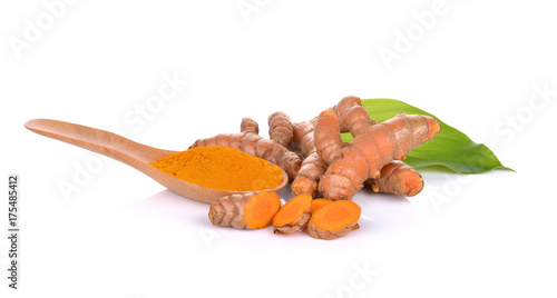 Turmeric roots on white background photo
