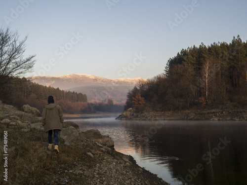 Soltitary young woman taking a walk outdoors © mastock