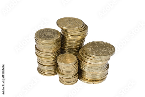 Stacks of copper Ukrainian coins on white background