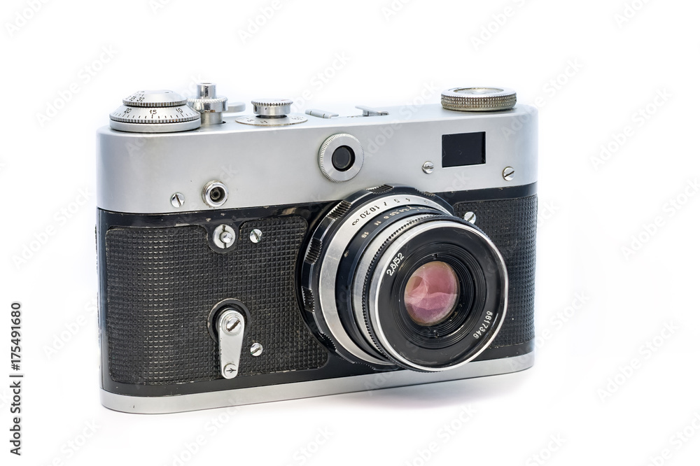 Analog soviet camera FED isolated on white background. Old dusty retro film photographic equipment.