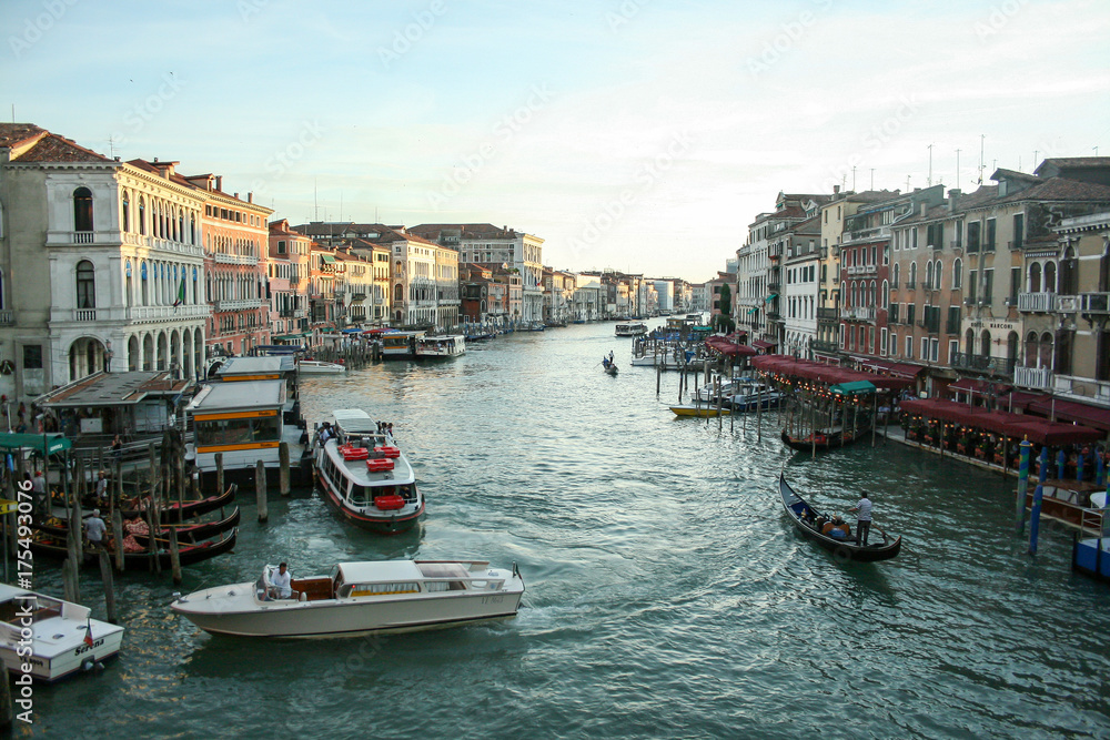 Venice, Italy - June 21, 2010: The people at water transport at Grand Canal. View from Rialto bridge