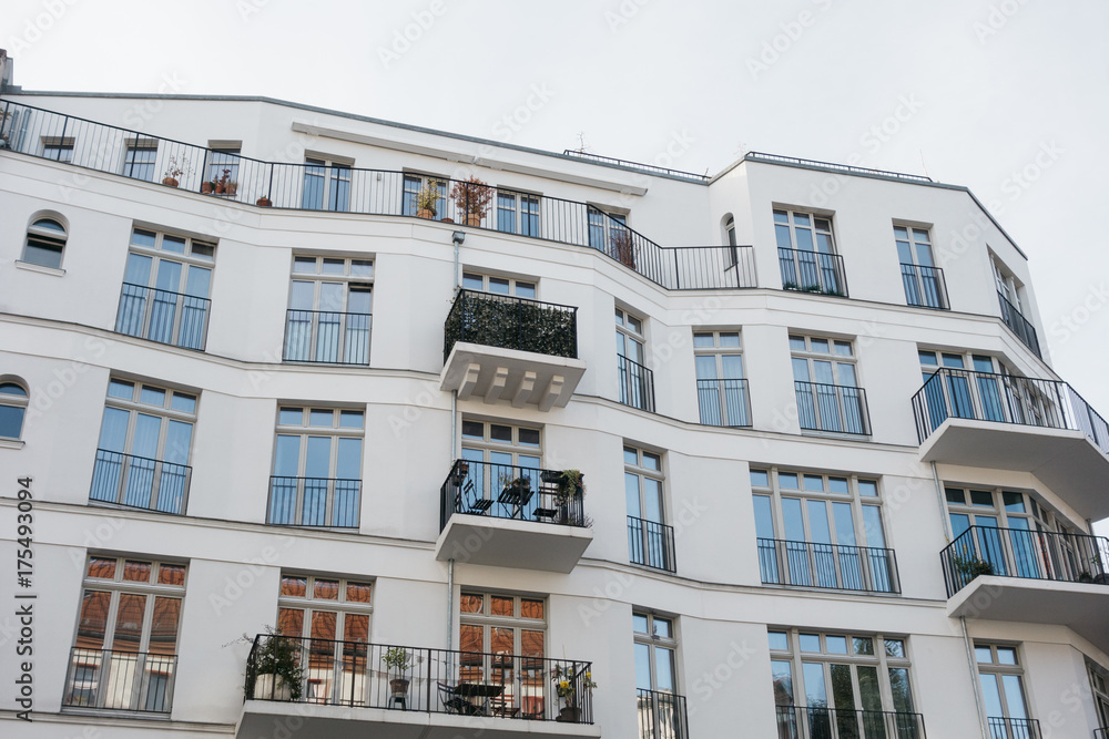 Obraz premium modern and white apartment building exterior
