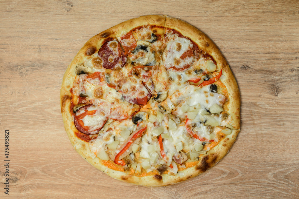 Fresh tasty pizza Margarita on wooden background