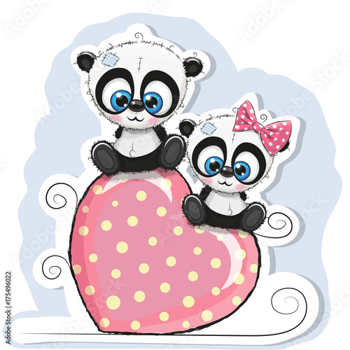 Fototapeta Naklejka Na Ścianę i Meble -  Two Pandas is sitting on a heart