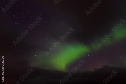 Northern Lights Dancing with Stars in Iceland © A_Skorobogatova