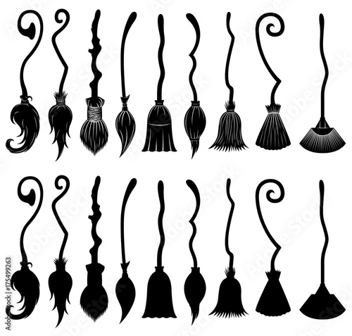 Set of different witch brooms isolated on white photo