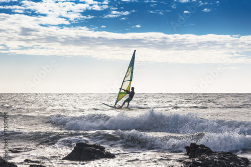 Man windsurfing in sea, Jericoacoara National Park, Ceara, Brazil