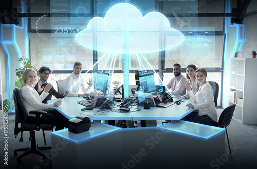 happy business team with cloud computing hologram photo