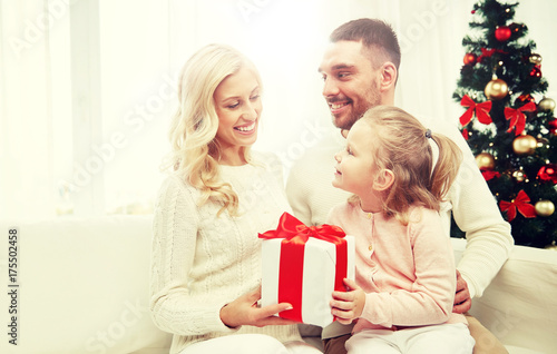 happy family at home with christmas gift box