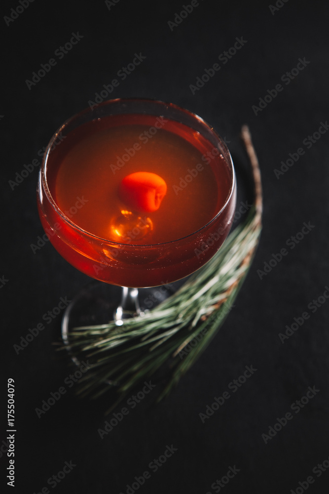 Manhattan cocktail on dark background Manhattan cocktail on dark background