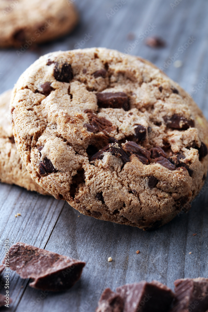 Chocolate cookies on wooden table. Chocolate chip cookies shot. Chocolate cookies on wooden table. Chocolate chip cookies shot.