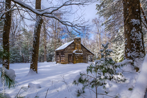 A historic cabin in the snow at Smoky Mtn Nat'l Park's Cades Cove