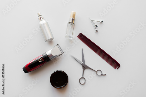 styling hair spray, trimmer and scissors