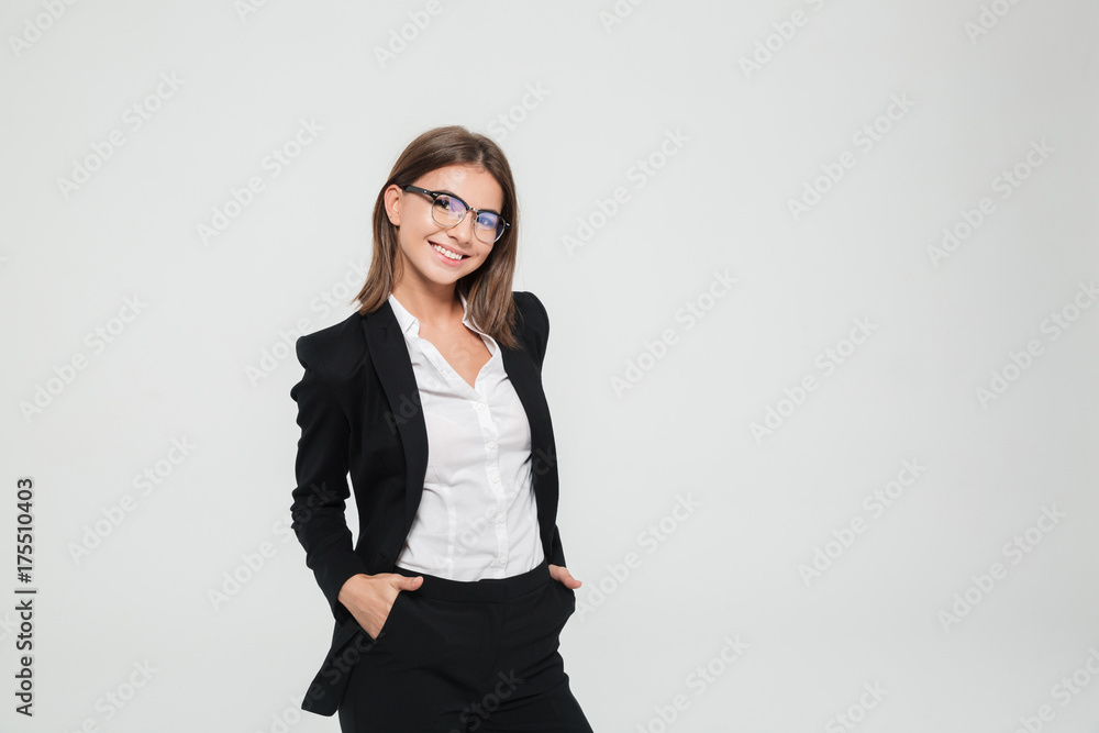 Portrait of a smiling businesswoman in suit