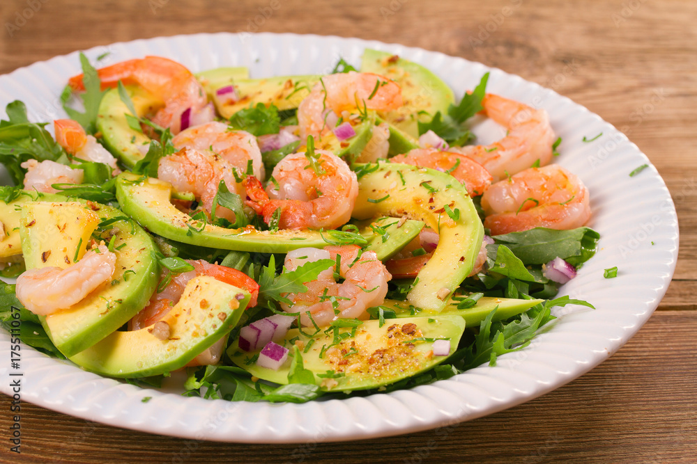 Shrimp salad with avocado arugula, scallion and almonds, horizontal Shrimp salad with avocado arugula, scallion and almonds, horizontal