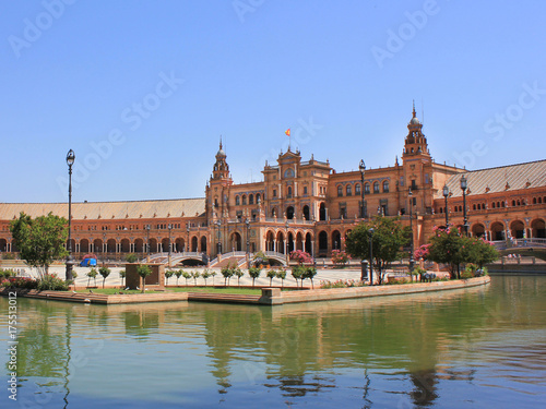 Plaza de Espana world famous Square in Seville. Renaissance Revival style in Spanish architecture. Buildings complex with wide walkways and no people on summer sunny day scene with empty copy space