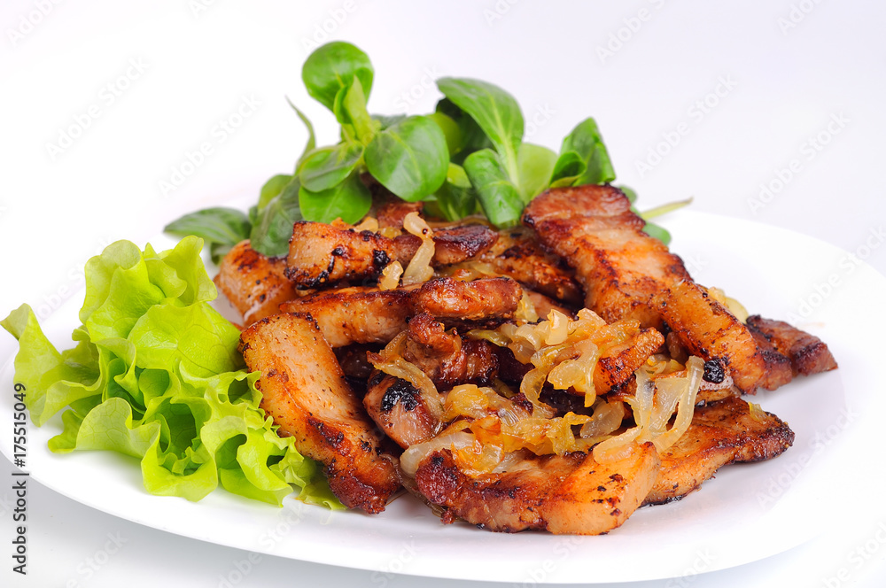 Grilled meat cracklings isolated on white backround Grilled meat cracklings isolated on white backround