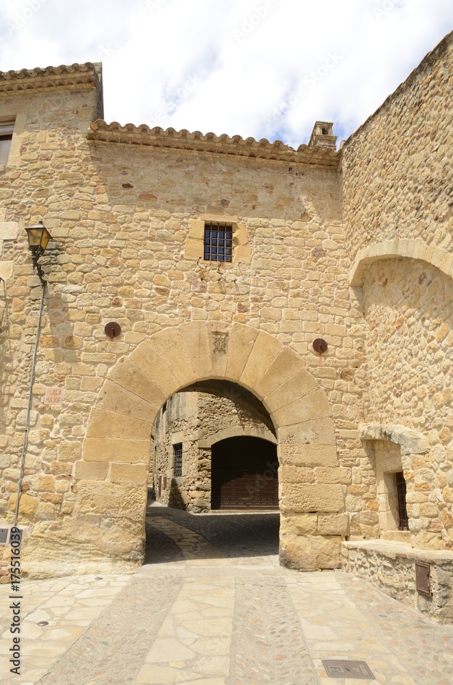 Arch to passageway  in Pals, Girona, Spain