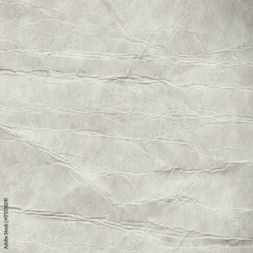 Fotografia Recycled grey creased and stained paper texture background