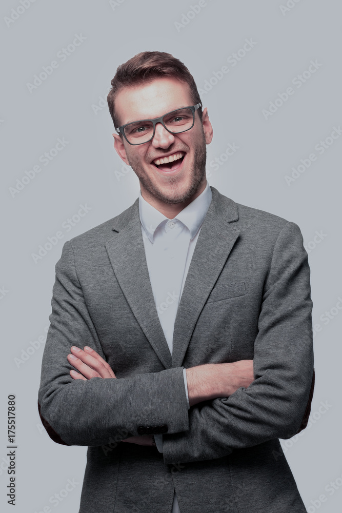 Close up portrait of emotional happy business man with crossed Close up portrait of emotional happy business man with crossed