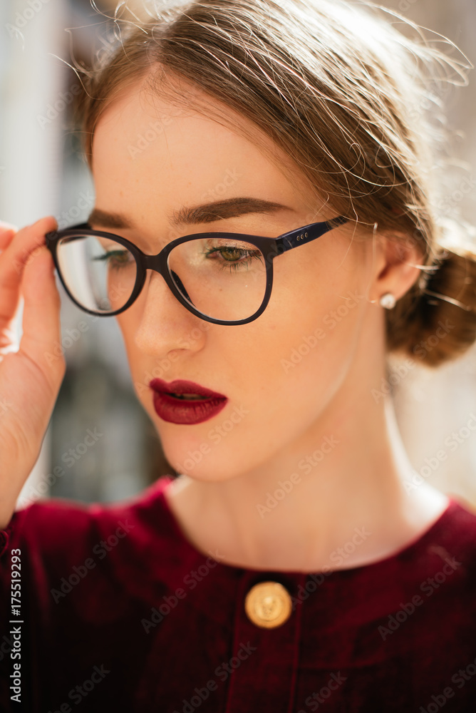 Beautiful girl with glasses on a walk Beautiful girl with glasses on a walk