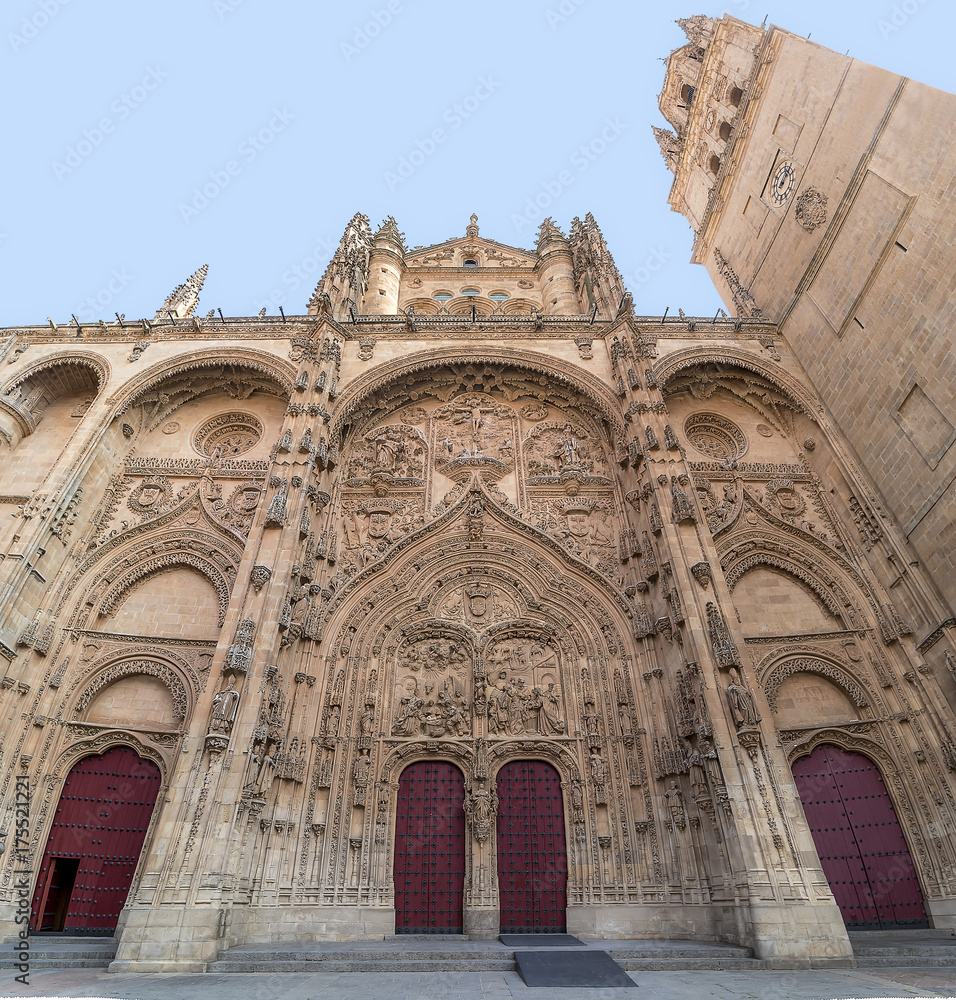 Main facade of Salamanca New Cathedral with red doors, Community of Castile and León, Spain.  Declared a World Heritage Site in 1988