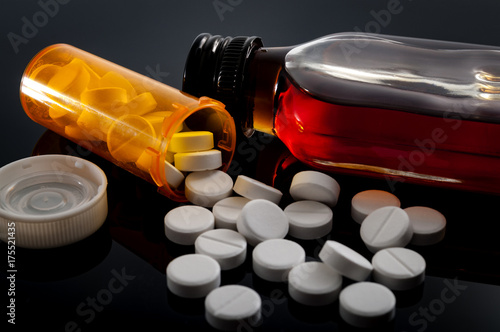 Photos Opioid epidemic, drug abuse and dangerous mixing of barbiturates and alcohol con