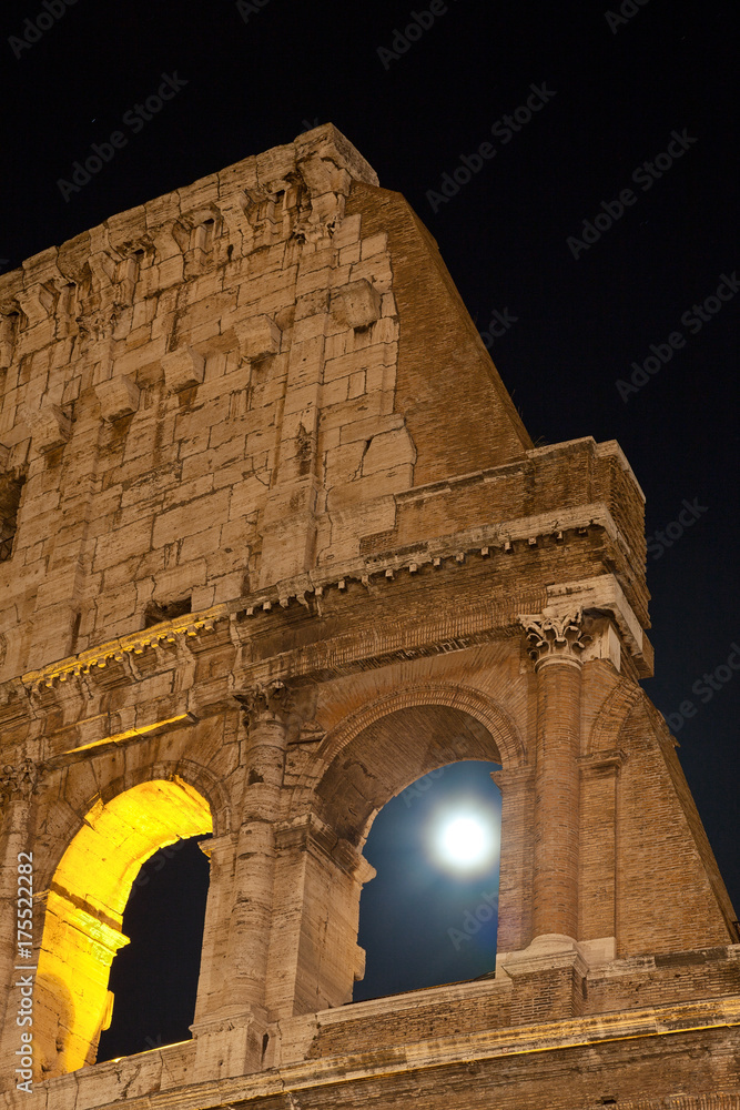 Part of Colosseum,  night view, full moon. Rome,Italy.