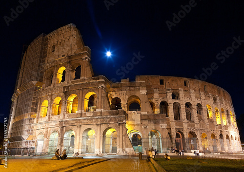 Colosseum night view   full moon . Rome Italy.
