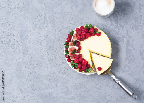 Cheesecake with raspberries and figs on a gray background, raspberry, berries, cake, horizontal, selective focus, sweets
