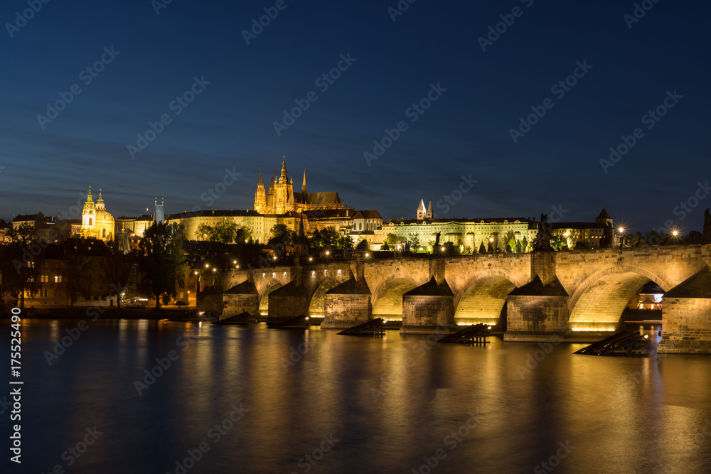 Prague Castle and Charles bridge at dusk