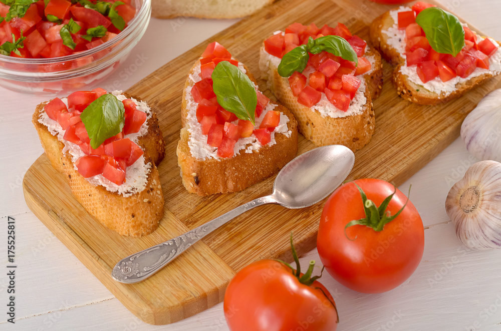 bruschetta with tomato on table