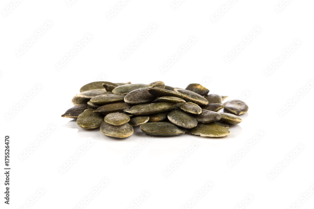 Pumpkin seeds on a white background Pumpkin seeds on a white background