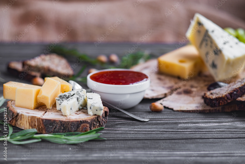 cheeses on wood are chopped deliciously and nutritionally