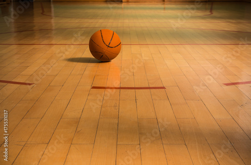 Basketball court with ball, hardwood floor © Sonate