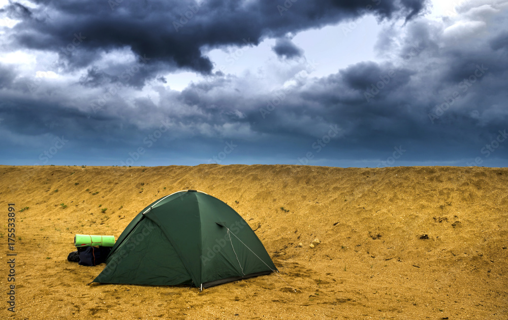 green tent at the beach